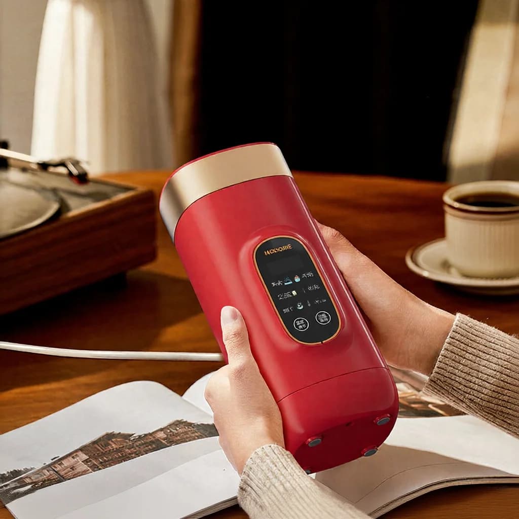 Kannettava sähköinen vedenlämmitysmuki 650ml 304-sisus 220V