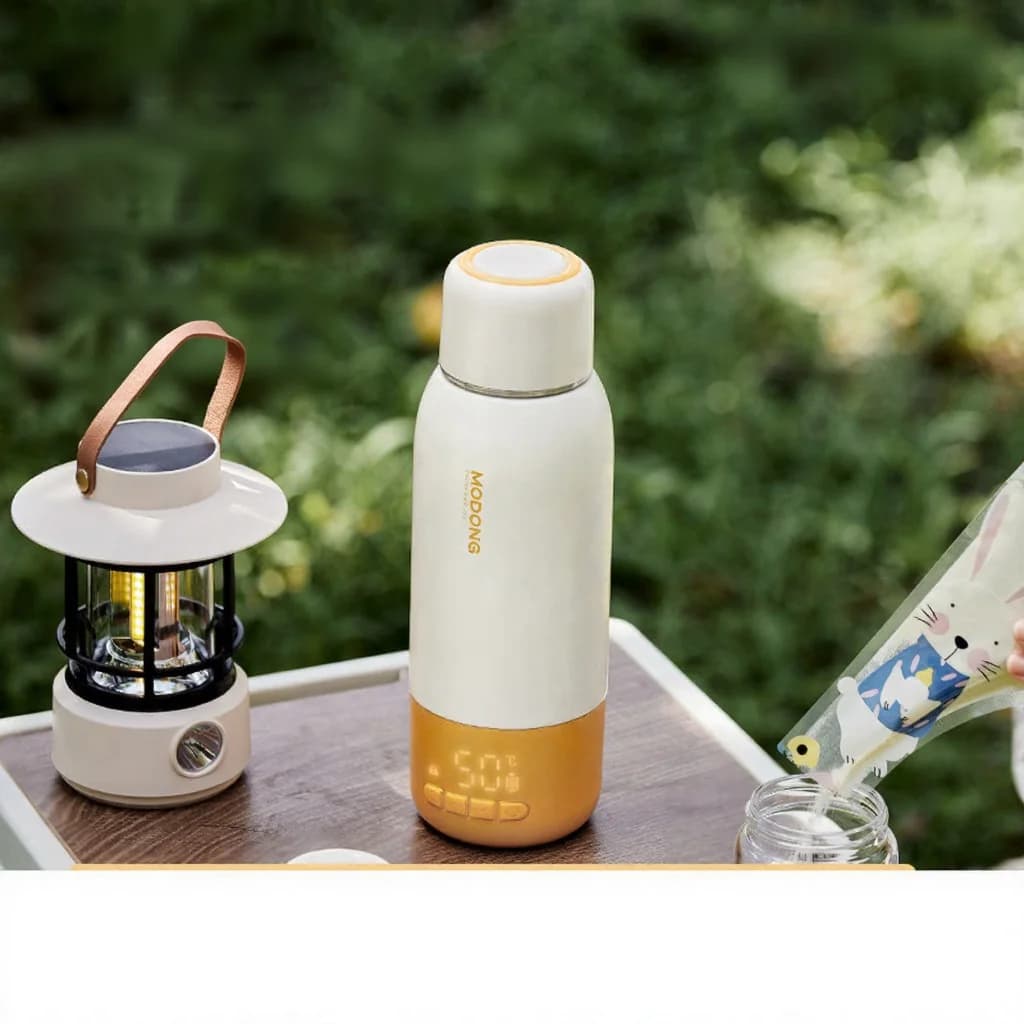 Kannettava vauvan korvikkeen lämmityskuppi 550 ml Ultra, verkkovirtakeitin + johdoton lämmitys