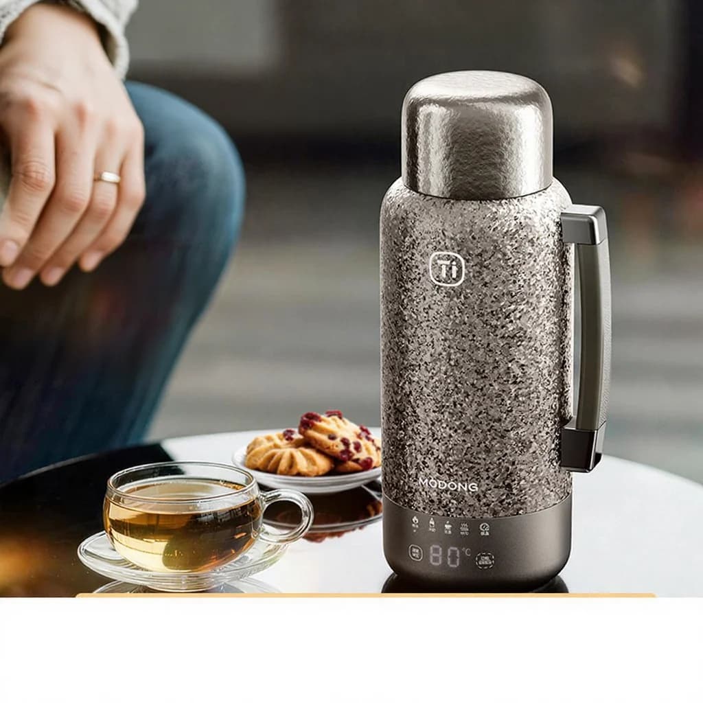 Puhdas titaani sähköinen lämmityskuppi eristyksellä 1200ml